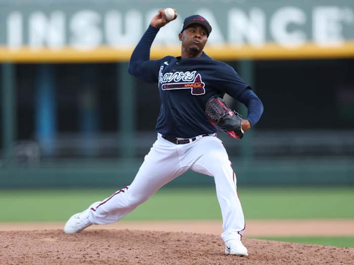 Feb 27, 2023; North Port, Florida, USA; Atlanta Braves relief pitcher Raisel Iglesias (26) throws a pitch against the Toronto Blue Jays in the fifth inning during spring training at CoolToday Park.